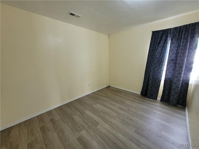 196 Kilhoffer St Unit B, Buffalo, NY 14211 - empty room featuring wood finished floors and baseboards
