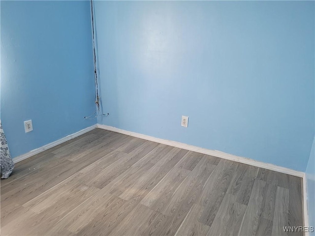 196 Kilhoffer St Unit B, Buffalo, NY 14211 - spare room featuring wood finished floors and baseboards