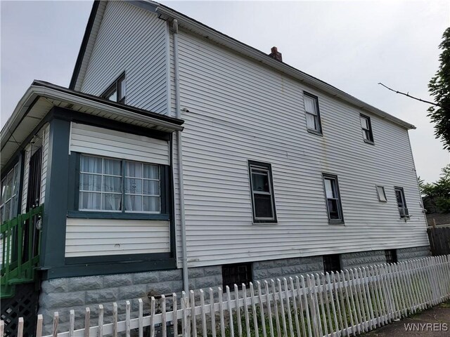 196 Kilhoffer St Unit B, Buffalo, NY 14211 - view of home's exterior with a chimney