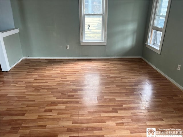 1014 N Union St, Olean-City, NY 14760 - unfurnished room with wood finished floors and baseboards