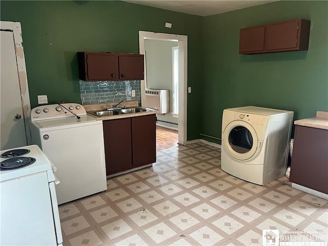 1014 N Union St, Olean-City, NY 14760 - washroom featuring washer / dryer, light flooring, and radiator heating unit