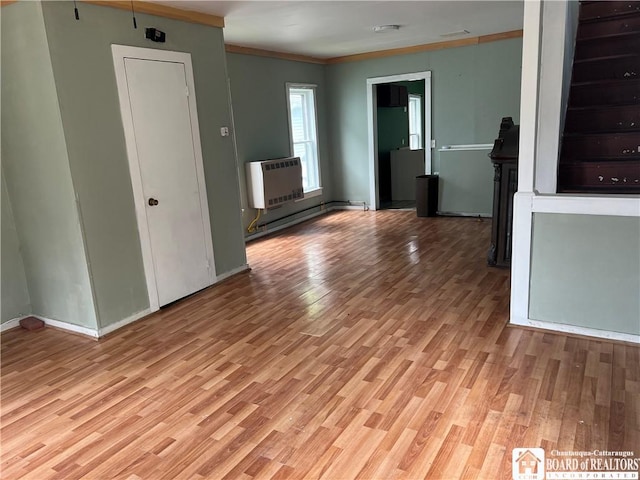 1014 N Union St, Olean-City, NY 14760 - unfurnished room with light wood-style floors, crown molding, and heating unit