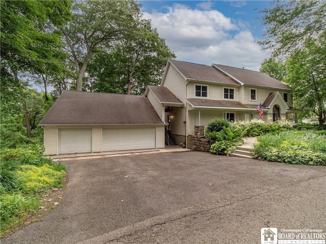 5 Summit Park Dr, Ellery, NY 14712 - view of front of house featuring covered porch and an attached garage