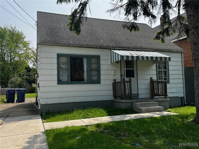 401 Ideal St, Buffalo, NY 14206 - bungalow-style home featuring a shingled roof and a chimney