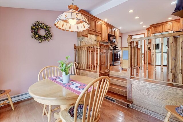 921 Wayneport Rd, Macedon, NY 14502 - dining space with light wood finished floors, recessed lighting, and baseboard heating
