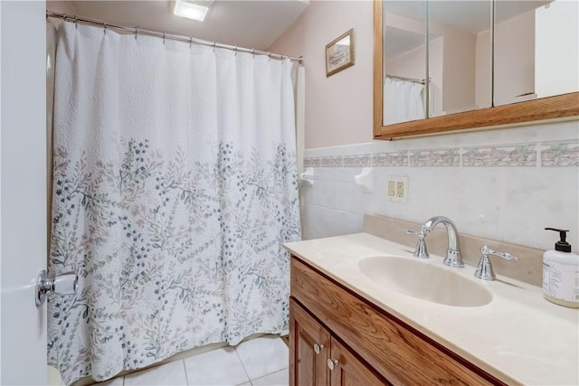 921 Wayneport Rd, Macedon, NY 14502 - bathroom featuring vanity, tile patterned flooring, tile walls, a wainscoted wall, and a shower with curtain