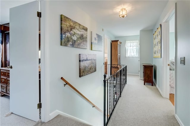 921 Wayneport Rd, Macedon, NY 14502 - corridor with an upstairs landing and light carpet