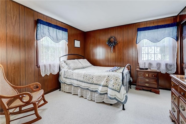 921 Wayneport Rd, Macedon, NY 14502 - bedroom with light carpet and wooden walls