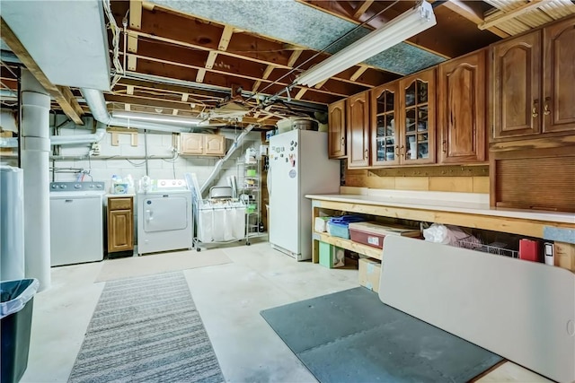 921 Wayneport Rd, Macedon, NY 14502 - unfinished below grade area with washer and dryer and freestanding refrigerator