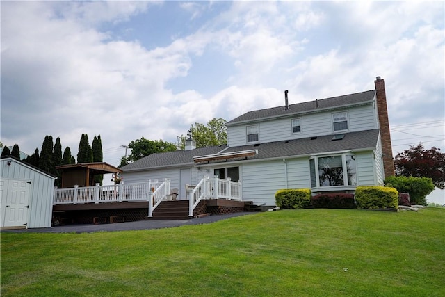 921 Wayneport Rd, Macedon, NY 14502 - rear view of house featuring a wooden deck, a storage shed, a lawn, and a chimney