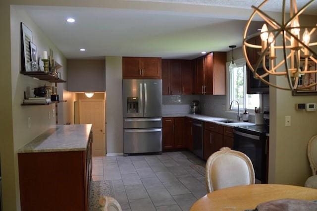 57 Timberline Dr, Penfield, NY 14526 - kitchen featuring appliances with stainless steel finishes, a chandelier, recessed lighting, light countertops, and pendant lighting