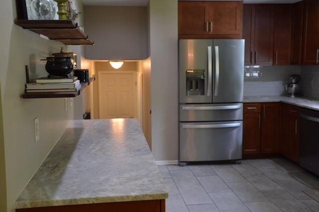 57 Timberline Dr, Penfield, NY 14526 - kitchen with stainless steel appliances, light tile patterned floors, and tasteful backsplash