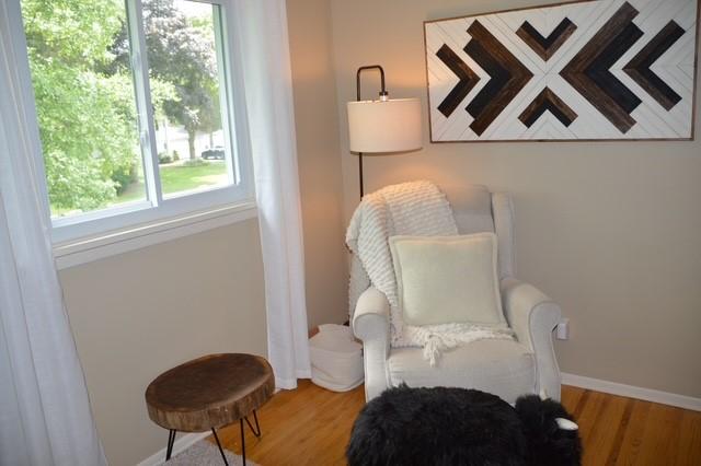 57 Timberline Dr, Penfield, NY 14526 - sitting room with wood finished floors and baseboards