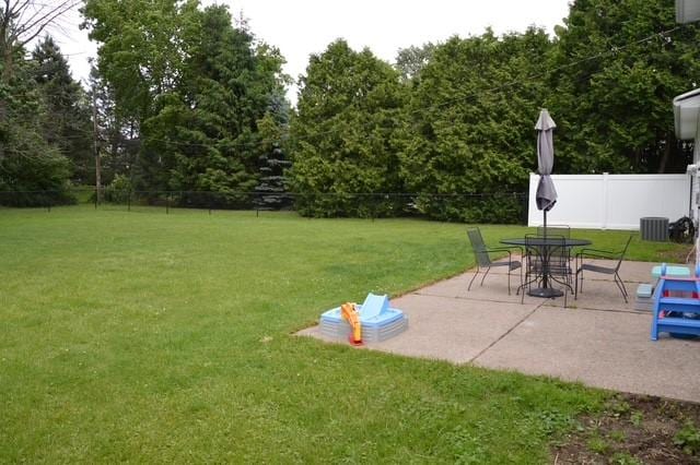 57 Timberline Dr, Penfield, NY 14526 - fenced backyard with a patio