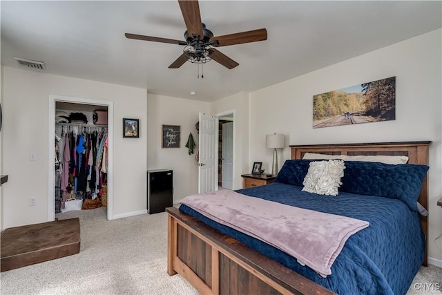 33039 County Route 22, Antwerp, NY 13691 - bedroom with light colored carpet, a spacious closet, ceiling fan, and a closet
