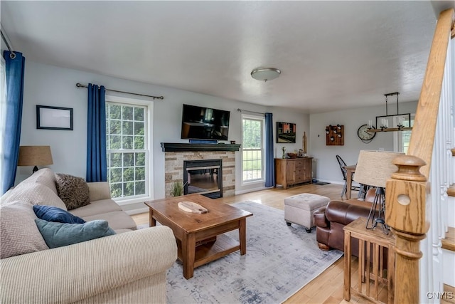 33039 County Route 22, Antwerp, NY 13691 - living room with light wood-type flooring and a fireplace