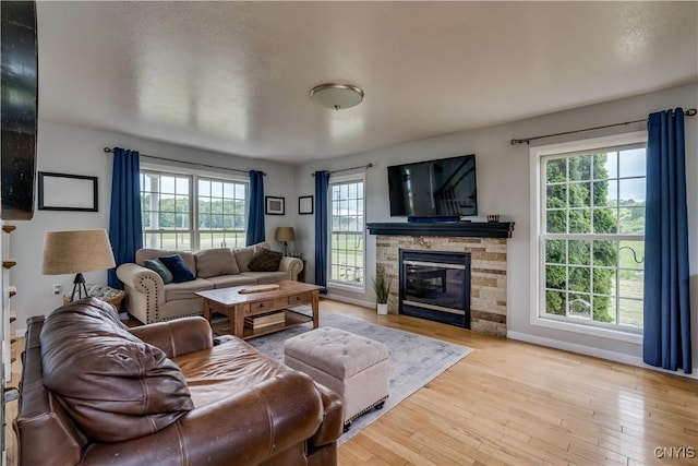 33039 County Route 22, Antwerp, NY 13691 - living area featuring hardwood / wood-style flooring and a fireplace