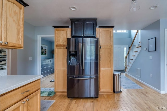 33039 County Route 22, Antwerp, NY 13691 - kitchen with stainless steel fridge, light wood-type flooring, light countertops, and recessed lighting