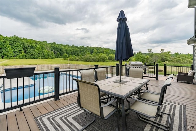 33039 County Route 22, Antwerp, NY 13691 - wooden terrace with outdoor dining area and a view of trees