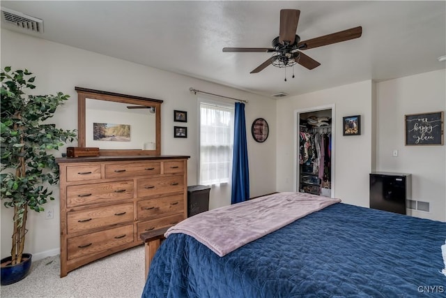 33039 County Route 22, Antwerp, NY 13691 - bedroom with a spacious closet, a ceiling fan, and light colored carpet