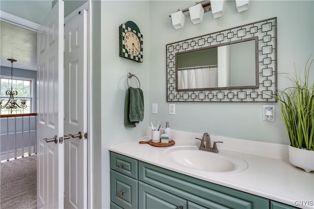 33039 County Route 22, Antwerp, NY 13691 - full bath featuring vanity and a chandelier