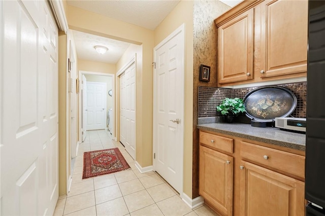 148 Maryview Dr Unit 148, Webster, NY 14580 - hall with light tile patterned floors and baseboards