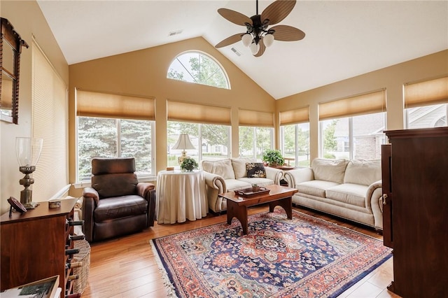 148 Maryview Dr Unit 148, Webster, NY 14580 - living room with a ceiling fan, light wood-type flooring, and high vaulted ceiling