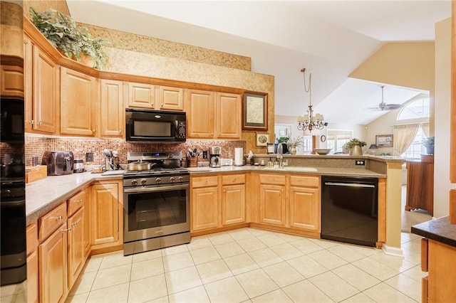 148 Maryview Dr Unit 148, Webster, NY 14580 - kitchen with black appliances, a peninsula, vaulted ceiling, decorative backsplash, and a ceiling fan