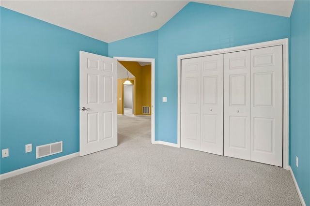 189 Maryview Dr, Penfield, NY 14580 - unfurnished bedroom featuring lofted ceiling, carpet floors, and a closet