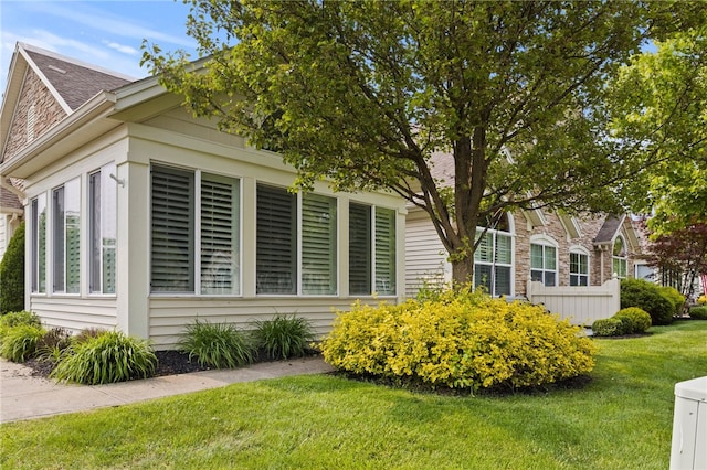 189 Maryview Dr, Penfield, NY 14580 - view of home's exterior with a lawn and a shingled roof