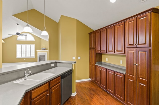 189 Maryview Dr, Penfield, NY 14580 - kitchen featuring stainless steel dishwasher, vaulted ceiling, decorative light fixtures, dark wood-type flooring, and ceiling fan