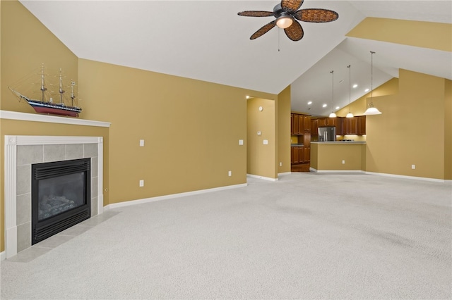 189 Maryview Dr, Penfield, NY 14580 - unfurnished living room featuring a ceiling fan, a fireplace, light colored carpet, and high vaulted ceiling
