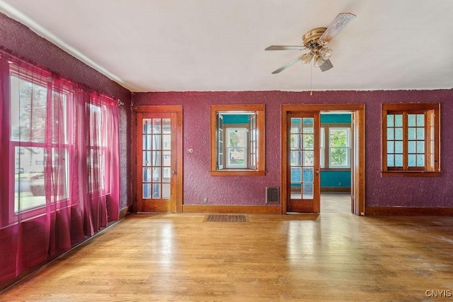 218-20 Avery Ave, Syracuse, NY 13204 - unfurnished room featuring wood finished floors and ceiling fan