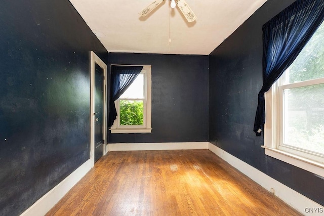 218-20 Avery Ave, Syracuse, NY 13204 - spare room with wood finished floors and a ceiling fan