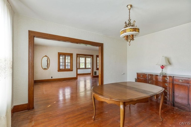 218-20 Avery Ave, Syracuse, NY 13204 - dining space featuring wood finished floors and a textured wall