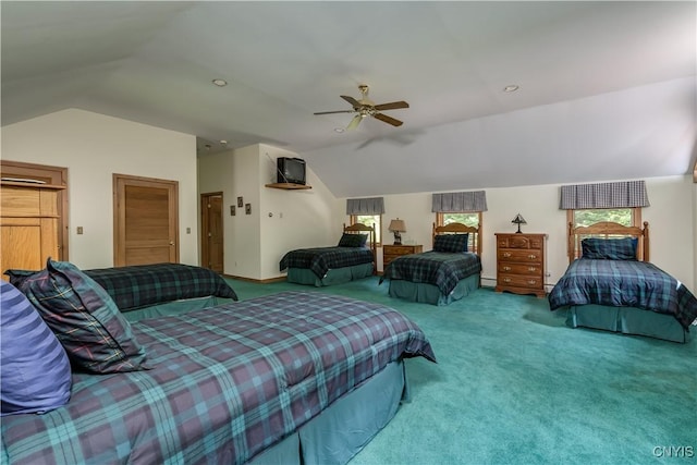 8782 Buck Point Rd, Watson, NY 13367 - carpeted bedroom with lofted ceiling, multiple windows, ceiling fan, and baseboard heating