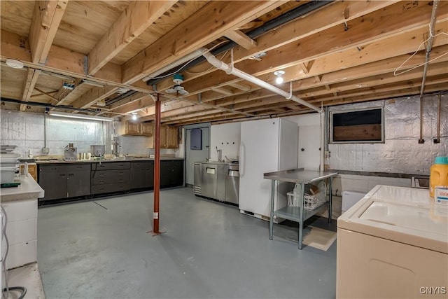 8782 Buck Point Rd, Watson, NY 13367 - unfinished basement with freestanding refrigerator and washer and dryer