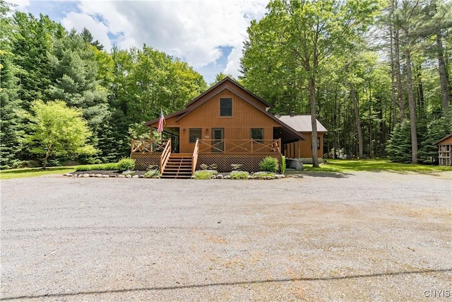 8782 Buck Point Rd, Watson, NY 13367 - chalet / cabin with covered porch and driveway