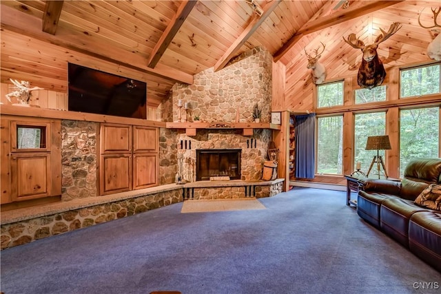 8782 Buck Point Rd, Watson, NY 13367 - carpeted living area with a wooden ceiling with exposed beams, high vaulted ceiling, a fireplace, and wood walls