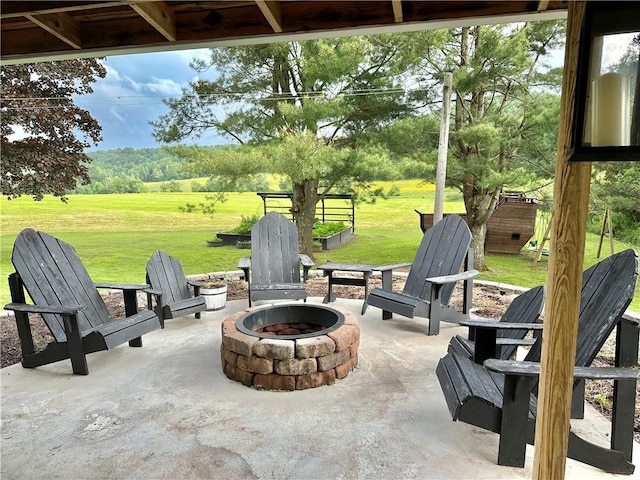 496 Burdick Medbury Rd, Norwich-Town, NY 13815 - view of patio / terrace featuring a fire pit