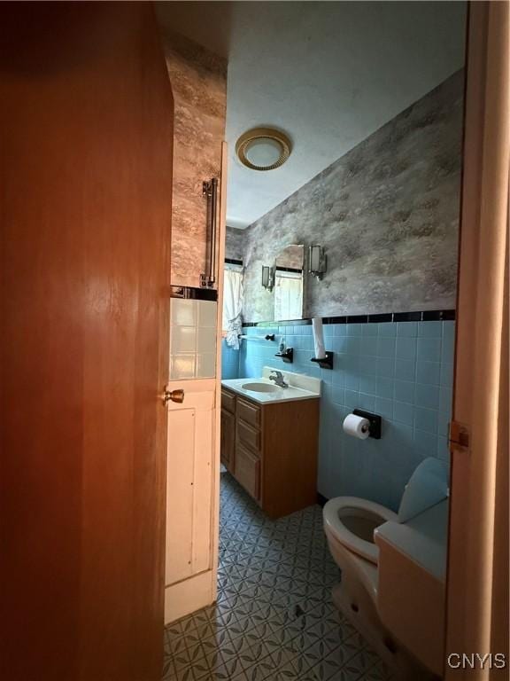 5877 State Route 233, Westmoreland, NY 13440 - bathroom featuring tile walls and vanity