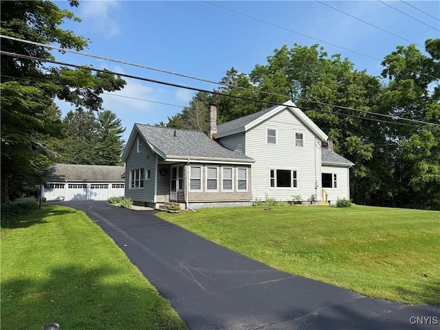 5877 State Route 233, Westmoreland, NY 13440 - traditional-style home featuring a chimney, a shingled roof, an outdoor structure, and a front lawn