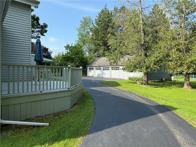 5877 State Route 233, Westmoreland, NY 13440 - view of home's community featuring a lawn, a detached garage, and an outbuilding