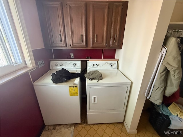75 Main St, North Dansville, NY 14437 - laundry room featuring washer and clothes dryer and cabinet space