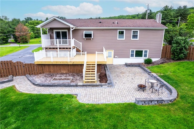 1192 Clendenning Rd, Lindley, NY 14870 - rear view of property featuring a fire pit, stairway, a deck, and a fenced backyard