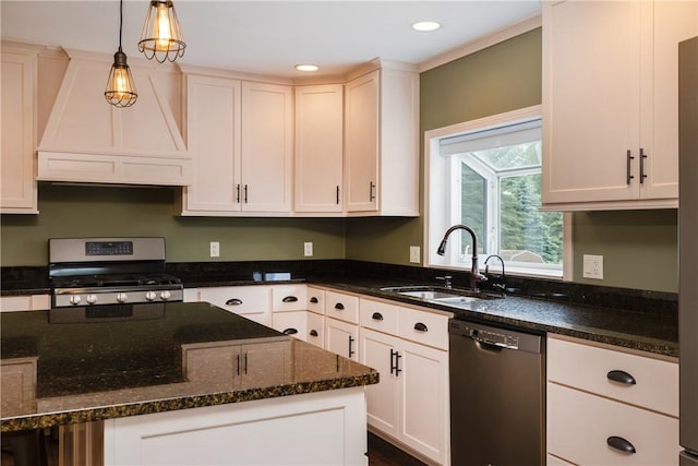 1192 Clendenning Rd, Lindley, NY 14870 - kitchen with stainless steel appliances, custom range hood, decorative light fixtures, white cabinets, and recessed lighting