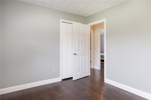 1192 Clendenning Rd, Lindley, NY 14870 - unfurnished bedroom featuring dark wood-style floors and a closet