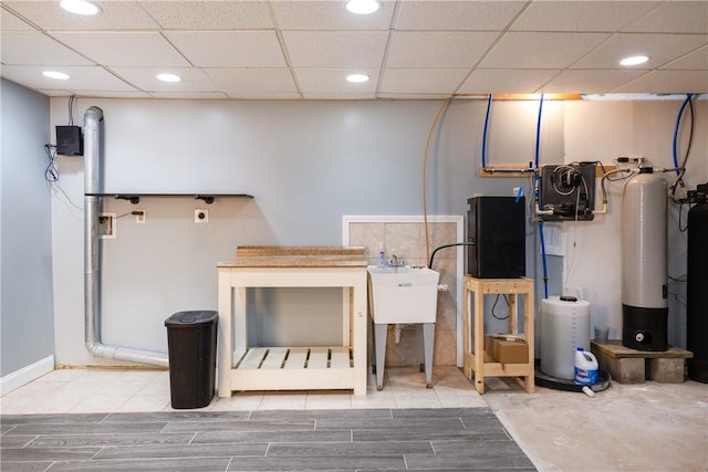 1192 Clendenning Rd, Lindley, NY 14870 - finished basement featuring recessed lighting, wood tiled floors, a water softener system, and a drop ceiling