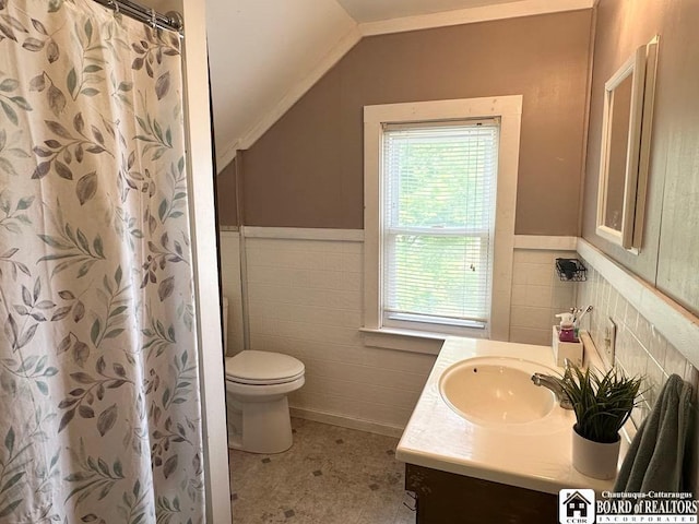 12 Juliet St, Jamestown, NY 14701 - bathroom with tile walls, vaulted ceiling, vanity, a wainscoted wall, and curtained shower
