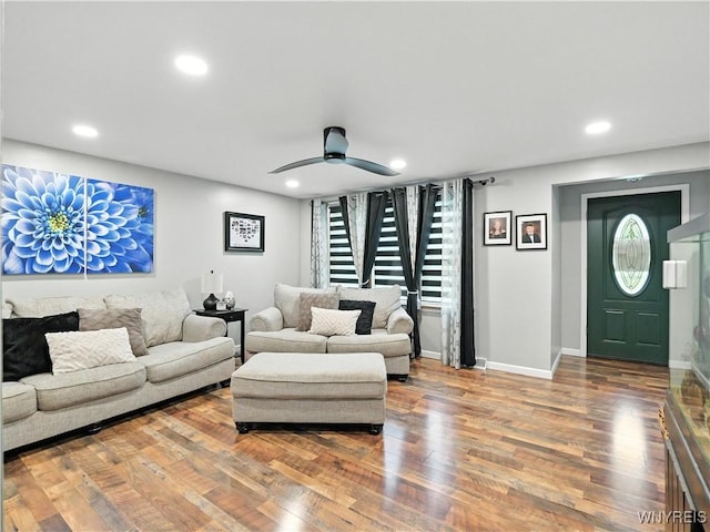 5137 William St, Lancaster, NY 14086 - living area featuring wood finished floors, ceiling fan, recessed lighting, and stairs